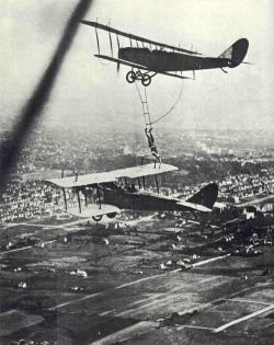 Aeronautic Stunt-Man Olmer Locklear Transferring From One Airplane To Another.