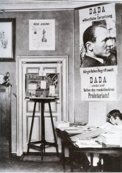 grupaok:  Erste Internationale Dada-Mess (First International Dada Fair), Otto Burchard Gallery, Berlin 1920—Main room, with Raul Hausmann, John Heartfield, George Grosz and Dada puppets. 