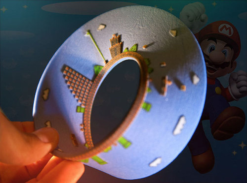 it8bit:  Super Mario Mobius Strip Created by Joaquin Baldwin Mind-bending reality-distortion strip available for purchase at shapeways. 