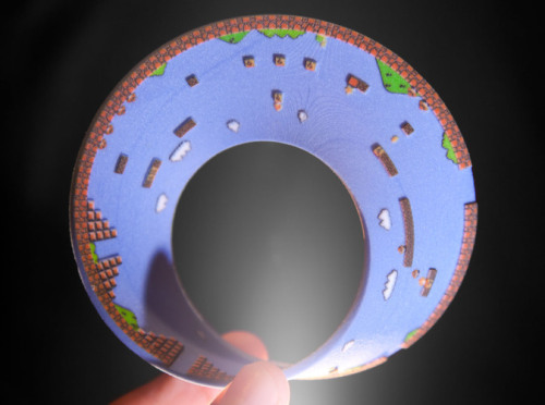 it8bit:  Super Mario Mobius Strip Created by Joaquin Baldwin Mind-bending reality-distortion strip available for purchase at shapeways. 