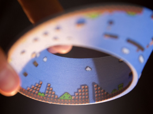 it8bit:  Super Mario Mobius Strip Created by Joaquin Baldwin Mind-bending reality-distortion strip available for purchase at shapeways. 