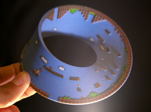 it8bit:  Super Mario Mobius Strip Created by Joaquin Baldwin Mind-bending reality-distortion strip available for purchase at shapeways. 