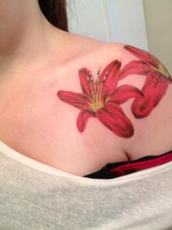 Fuckyeahtattoos:  These Are My Two Red Lilies On My Left Shoulder/Collar Bone. They