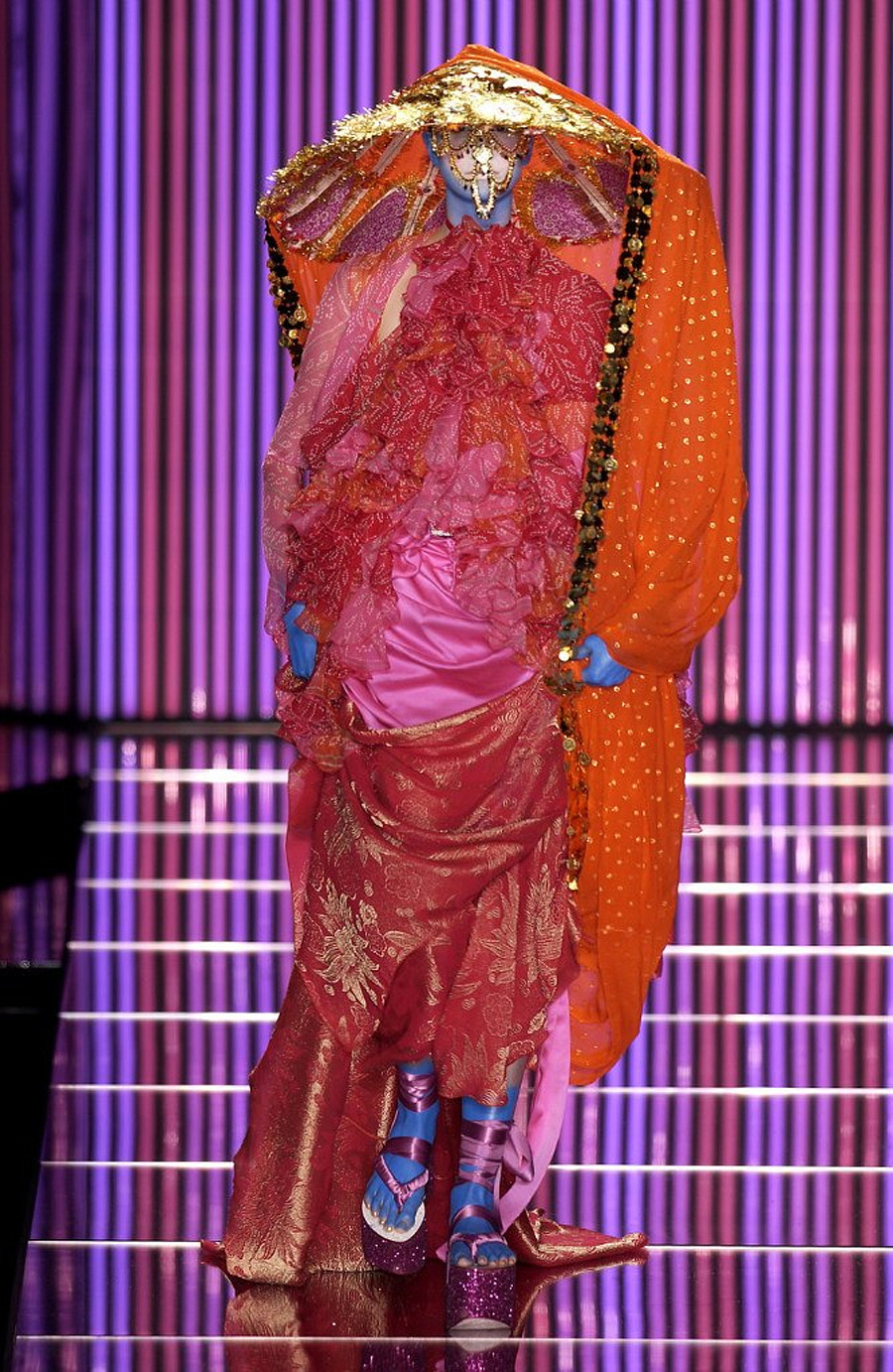 A model walks the runway in the John Galliano Spring 2003 Ready to News  Photo - Getty Images