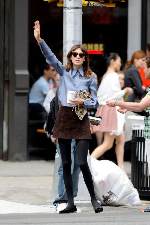 alexastyle: Alexa Chung sips on a coffee while hailing a cab in the West Village, New York City. Th