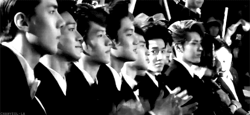 chanyeol-la-blog:  Suho checking up on his kids and he likes what he sees  