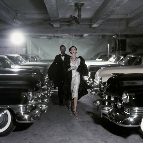 Model in Parking Garage Wearing Dress of White Brocade by Adele SimpsonJohn Rawlings (American; 1912