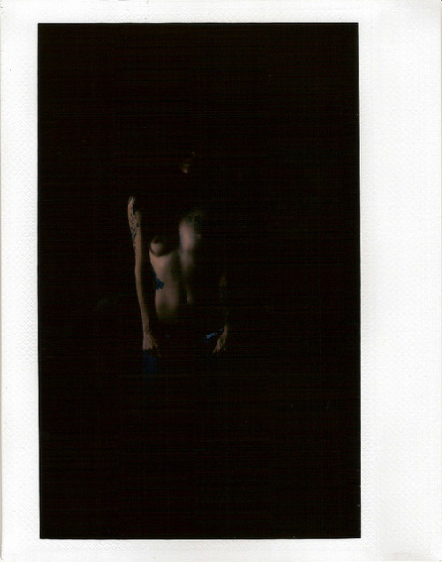 Krysta, her form barely visible in the soft afternoon window light. Krysta Kaos shot by Timothy Patrick Fuji Instax 210