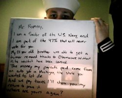  U.S Naval Officer writes a note to Mitt Romney. 