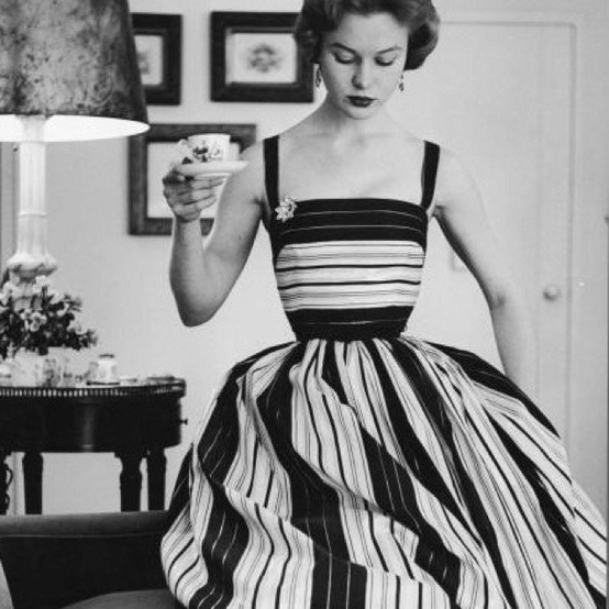 solo-vintage:  Model wearing a striped summer dresss, 1950s. 