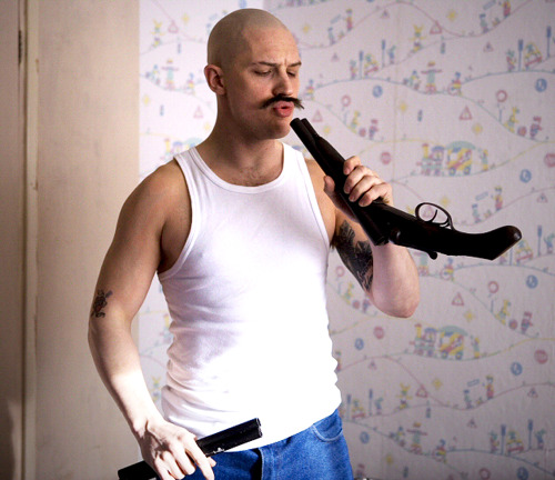 tomhardyvariations: Tom fooling around in classic Hardy style on the set of Bronson (bottom —