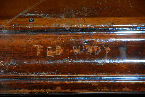 ramirezbundydahmer:  When Ted Bundy was on trial he carved his name into a Orange County Courthouse table. 