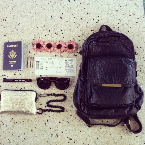 The essentials on my back. #passport #bobbypins #floralhairclip #sunglasses #boardingpass #y3 #passp