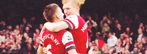 meeniemint: Per & Koscielny after the final whistle against ManCity