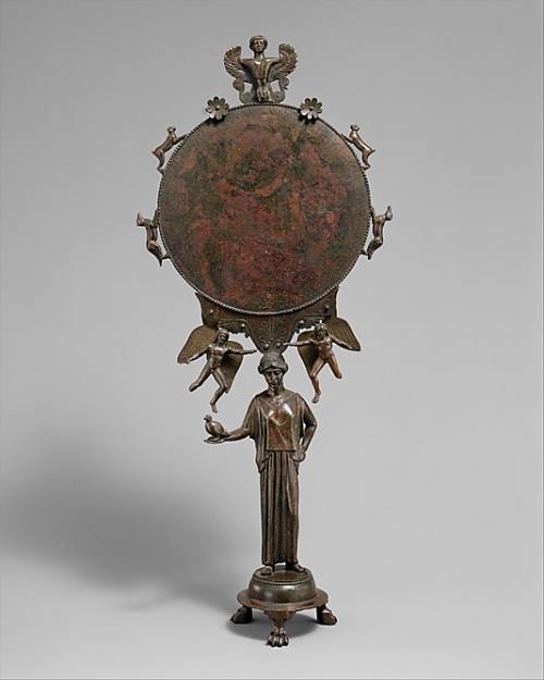 collectivehistory: Bronze mirror with a support in the form of a draped woman ca. 5th century B