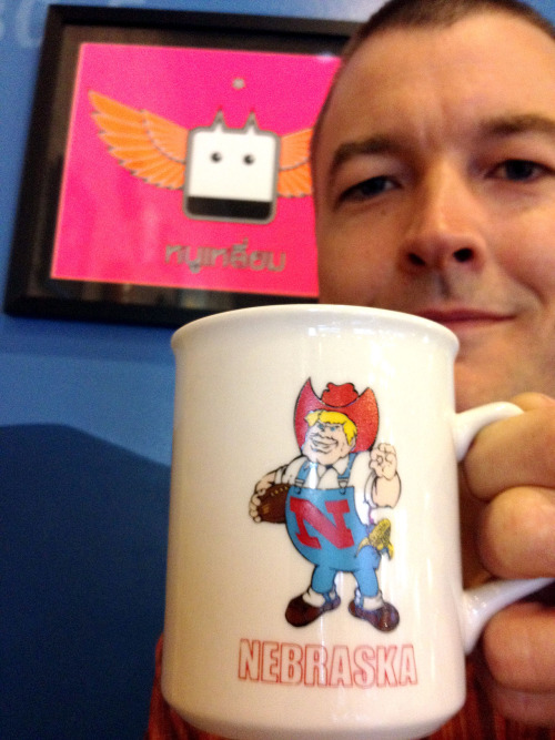 Mugshot Monday - “NEBRASKA Cornhusker Mascot” coffee mug with a Dirty Chai from Peace Coffee Shop
I don’t watch college football, except for a Badger game on occasion. So, I thought maybe this coffee mug was from a high school football program in...