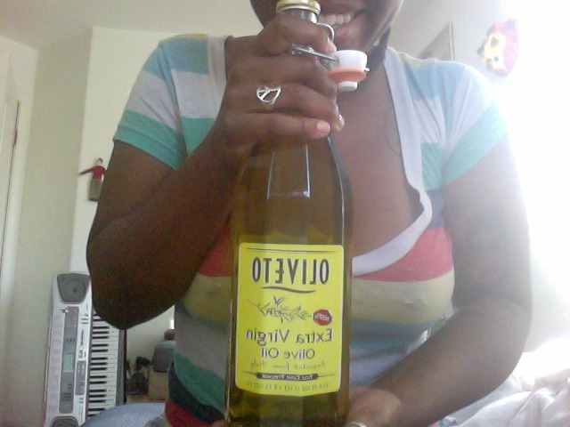 i bought this big ass bottle of olive oil, and its only for my hair. if i find out