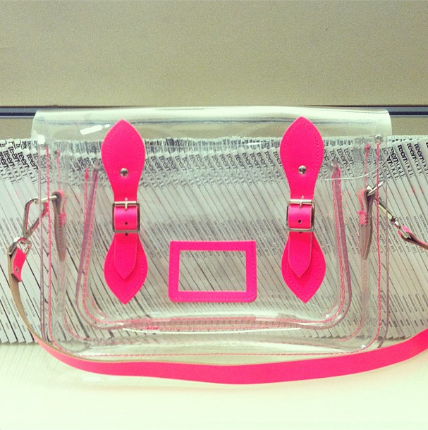 teenvogue:  Inside Teen Vogue: Lucite Cambridge Satchel with neon pink accents 