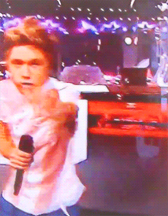kryptoniall-deactivated20150613:  Niall Horan + pointing at cameras destroying