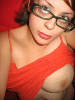lookatmyglasses:  Girl in orange shirt and