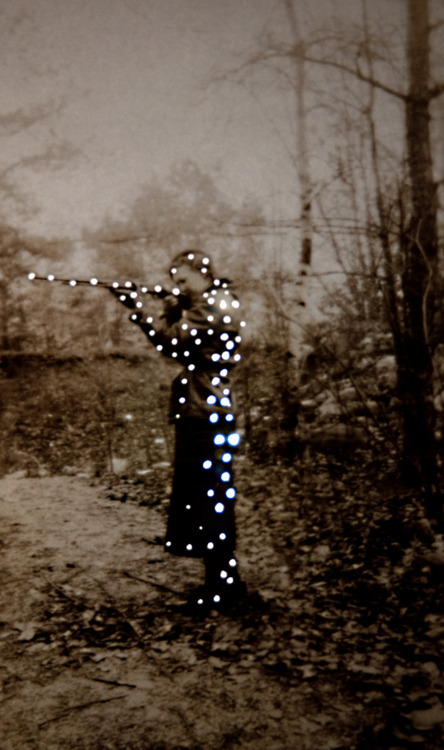 asylum-art: Vintage Photos Glow with Tiny Holes of Light - My Modern Metropolis Photographer