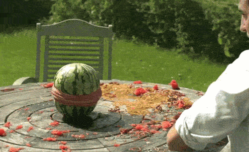 delirious-bitter-gardens:improbablenormality:rj4gui4r:Rubber bands squeezing through a watermelon.Be