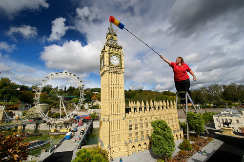 guardian:Staff dust down everything from tiny figures to huge models at Legoland in Windsor, Berkshi