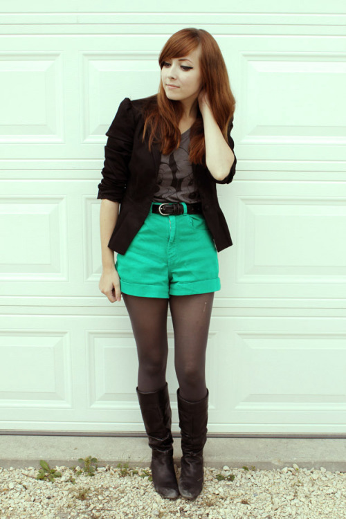 Green shorts, black pantyhose, and boots are fantastic!