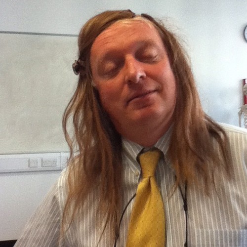 desir-3:  desir-3:  today my friend took out her hair extensions and my teacher was like ‘what are those?’ so we told him and he asked us to put them in his hair so we did and this is what he looked like    he loves his weaves look at that face 
