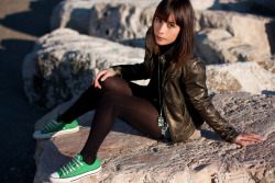 pantyhoseparty:  Black tights, leather jacket and green All Stars tennis shoes.