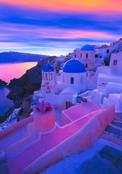 thatfuckingjoshkarr:  i’ve been here, this is in greece, santorini i believe. with the bkue rooftops and the amazing sunset.