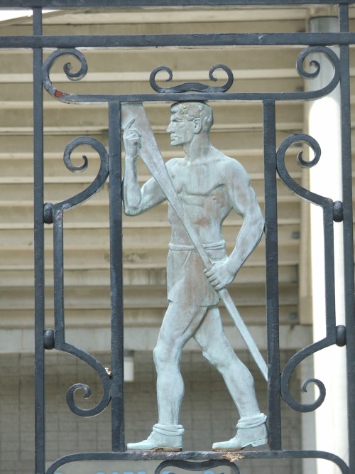 Fence detail of a crew member at the Baker Field Athletic Complex of Columbia University in Inwood, 