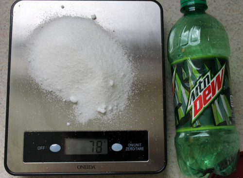 militaryfit-bombshell:  Just trying to put in perspective of how much sugar is in a bottle of soda. 31g sugar and the bottle is 2.5 servings. 31g x 2.5servings = 77.5g. Here is 78g of sugar displayed on my food scale.  