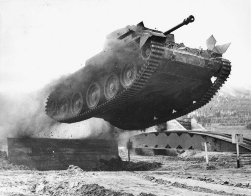 collective-history:A flying Cromwell Mk VIII tank at the Royal Armoured Corps testing grounds in Bov