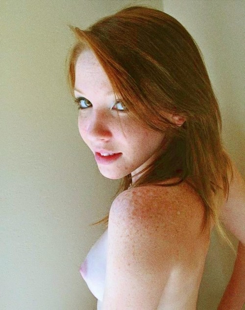 Porn Pics Pretty redhead with freckles, showing her
