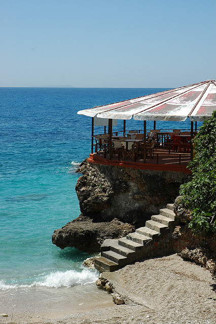 Terrace on the beach in southern Albania (by jontal12).