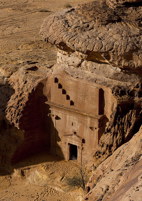 visitheworld:The rock carved tombs of Mada’in Saleh in Saudi Arabia (by Eric Lafforgue).