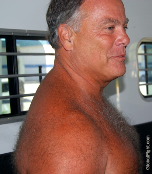 wrestlerswrestlingphotos:  hairy silver back arns delts chest daddie
