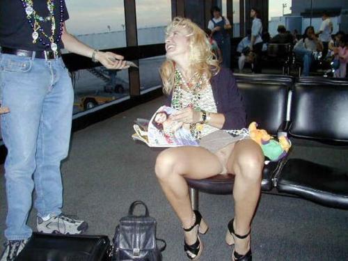 freedomwife:  Just love the casual, confident naughtiness she exhibits. Looks to be at the airport, maybe after Mardi Gras.