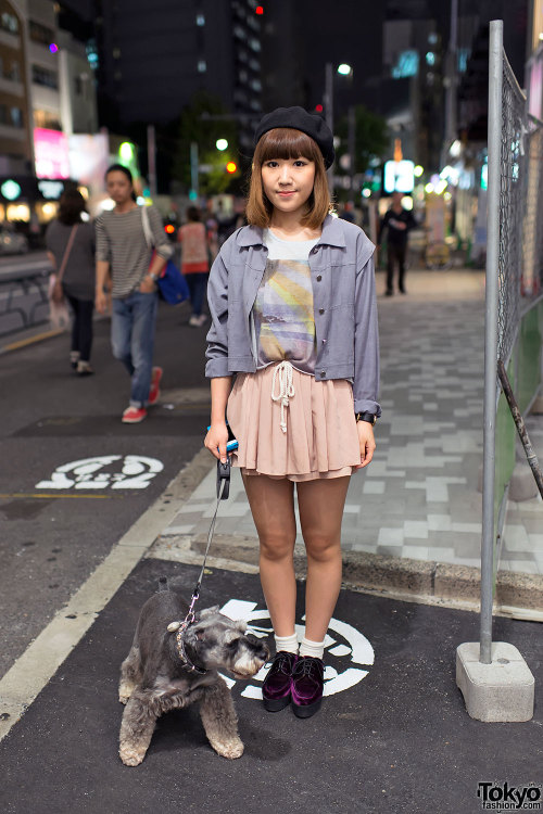Friendly girl in purple platforms walking a cute dog on the street in Harajuku tonight.