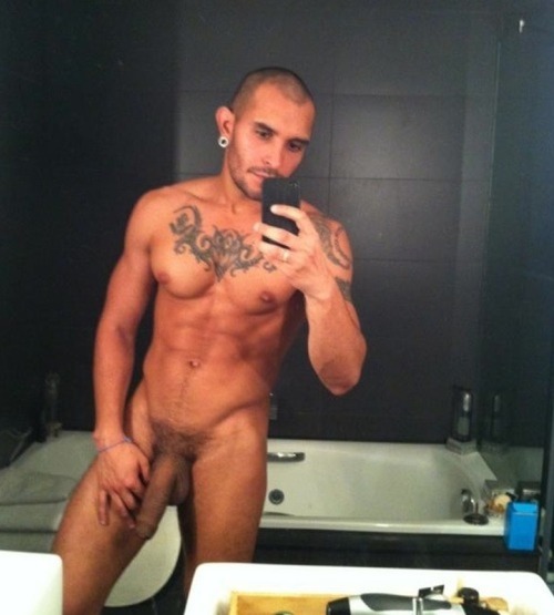 hot-naked-male-self-pics:  Defined, smooth, tattooed stud, with a treasure trail, big nipples, and an uncut cock!