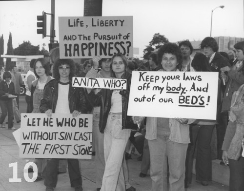 ineedtothinkofatitle:  10 Historical LGBT Moments Pictures courtesy of ONE National Gay & Lesbian Archives. 01. Police Officers Holding Hands At The Los Angeles Christopher Street West Pride Parade - 1972 02. Man Holds A ‘We Are Your Children’