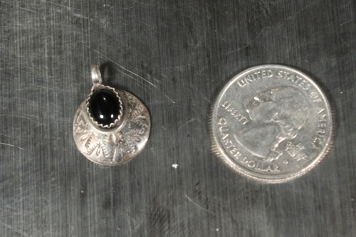 Vintage Sterling Silver Onyx pendant $6.49 here