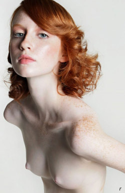 Redhead’s small breasts