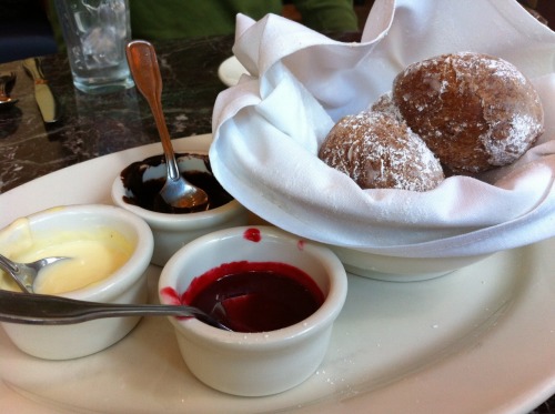 beignets with Jack Daniel&rsquo;s crème anglaise, hot fudge and raspberry sauce