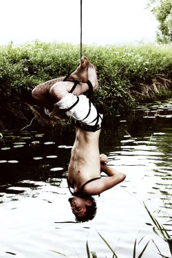 tapegaggedboy:  asphixiaskin:  I wonder how long he would last if I lowered him, long enough to spunk before he drowned?  This looks like trouble 