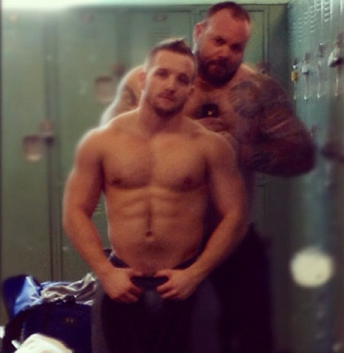 sepdxbear:  Talk about hot…These guys redefine the term :) inkedspirational:  Me and the lil man. inkedspirational.tumblr.com