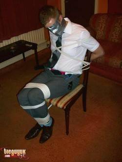 gaggedramdog:  Tied to a chair, Tape gagged and blindfolded! 