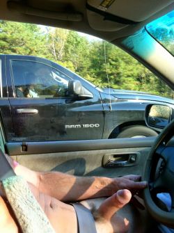 nakidpilot:  My wife Takes Pic of me driving with cock out… these two guys in the pickup just paced us and laughed at me!!!