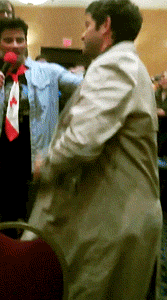blameitonthesilence:allthefandomfeelings:rithe:Misha steals a trenchcoat from a fan at Toronto Con ‘